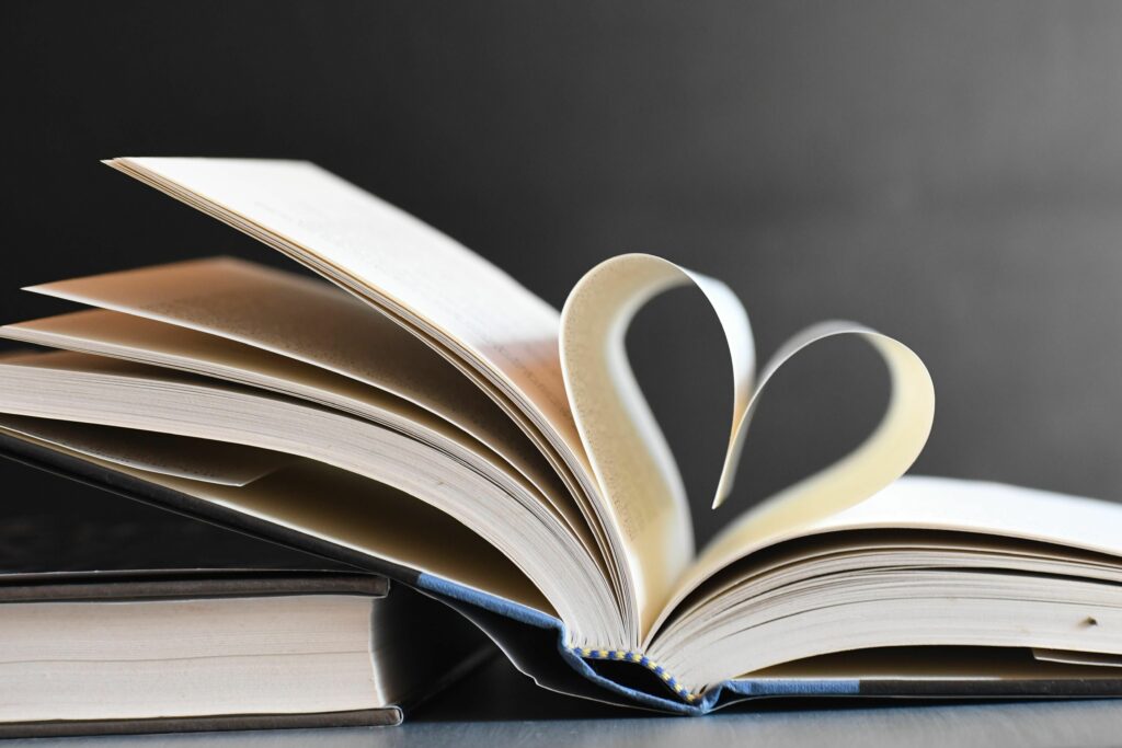 pexels photo 34260873 34260873 Open book with pages forming a heart, symbolizing love for reading and literature.
